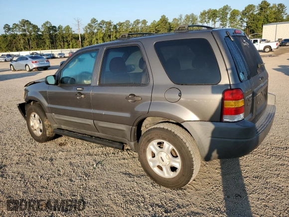 2004 Ford Escape XLT with VIN 1FMYU03154DA18466, listed as a Copart auction lot 70574604 with 168,553 mi miles and Salvage Title. Bid and sale history available at carsss.com. Image 2.
