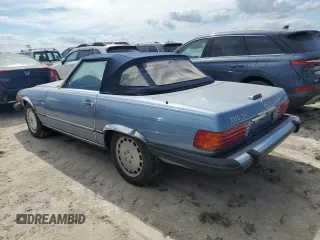 1989 Mercedes-Benz 560 SL with VIN WDBBA48D6KA097334, listed as a Copart auction lot 76158734 with 108,960 mi miles and Salvage Title. Bid and sale history available at carsss.com. Image 2.