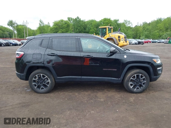 2019 Jeep Compass Trailhawk with VIN 3C4NJDDB7KT727762, listed as a IAAI auction lot 42299260 with 56,733 mi miles and . Bid and sale history available at DreamBid. Image 13.
