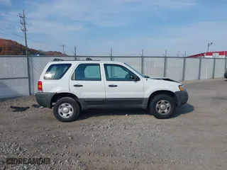 2003 Ford Escape XLS Popular with VIN 1FMYU92183KB46619, listed as a IAAI auction lot 40695244 with 0 mi miles. Bid and sale history available at carsss.com. Image 12.