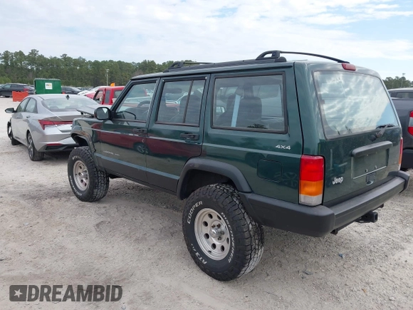 1999 Jeep Cherokee Sport with VIN 1J4FF68S1XL555463, listed as a IAAI auction lot 41898076 with 206,656 mi miles. Bid and sale history available at carsss.com. Image 3.