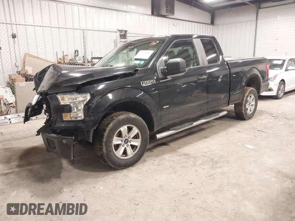 2015 Ford F-150 XLT with VIN 1FTEX1EP8FFC36723, listed as a IAAI auction lot 41738159 with 118,521 mi miles. Bid and sale history available at carsss.com. Image 2.