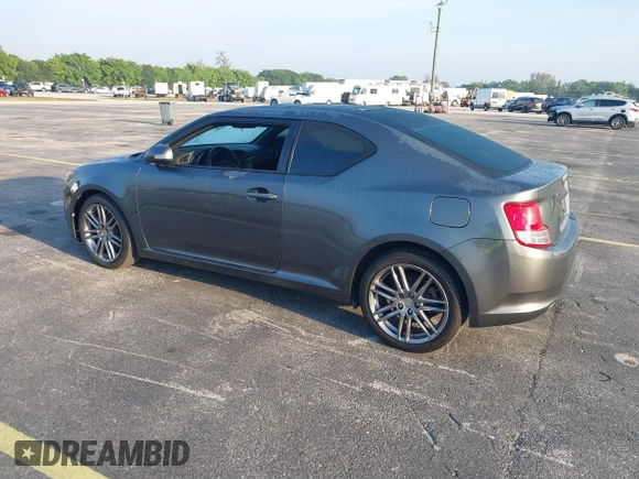 2012 Scion tC with VIN JTKJF5C74C3026945, listed as a IAAI auction lot 41757437 with 104,039 mi miles. Bid and sale history available at carsss.com. Image 3.