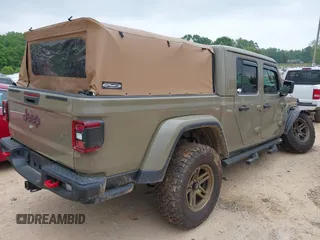 2020 Jeep Gladiator Rubicon z VIN 1C6JJTBG6LL179541, wystawiony jako IAAI lot #42050510 z przebiegiem 52 784 mil mil oraz . Historia ofert i sprzedaży dostępna na DreamBid. Obrazek 4.