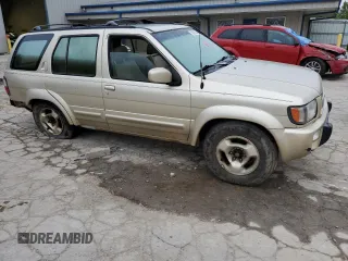 1997 Infiniti QX4 z VIN JNRAR05Y1VW016494, wystawiony jako Copart lot #73627434 z przebiegiem 270 857 mil mil oraz Szkody całkowita. Historia ofert i sprzedaży dostępna na DreamBid. Obrazek 4.