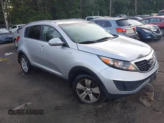 2011 Kia Sportage LX with VIN KNDPBCA20B7023282, listed as a IAAI auction lot 42569037 with 210,062 mi miles and . Bid and sale history available at DreamBid. Image 1.