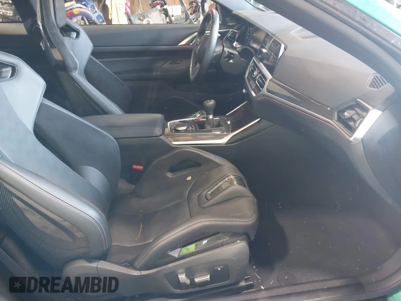 2023 BMW M4 with VIN WBS53AZ04PCM21453, listed as a IAAI auction lot 42751418 with 13,855 mi miles and . Bid and sale history available at DreamBid. Image 5.