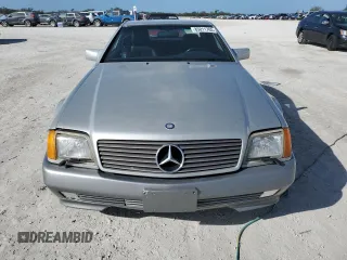 1991 MERCEDES-BENZ SL-CLASS SL with VIN WDBFA61E1MF022918, listed as a Copart auction lot 85011784 with 262,144 mi miles and Salvage Title. Bid and sale history available at DreamBid. Image 5.