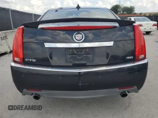 2010 Cadillac CTS Premium z VIN 1G6DP5EV2A0144524, wystawiony jako Copart lot #58913445 z przebiegiem 218 130 mil mil oraz Szkoda całkowita • Salvage title. Historia ofert i sprzedaży dostępna na DreamBid. Obrazek 6.