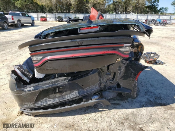 2019 Dodge Charger Scat Pack with VIN 2C3CDXGJ1KH735923, listed as a Copart auction lot 49290465 with 0 mi miles and Non Repairable. Bid and sale history available at carsss.com. Image 6.