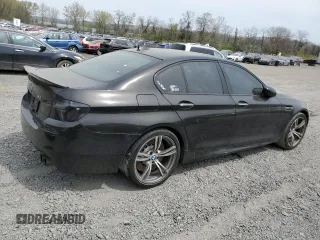 2013 BMW M5 z VIN WBSFV9C54DD095421, wystawiony jako Copart lot #53492515 z przebiegiem Nie podano mil oraz Szkoda całkowita • Salvage title. Historia ofert i sprzedaży dostępna na DreamBid. Obrazek 3.