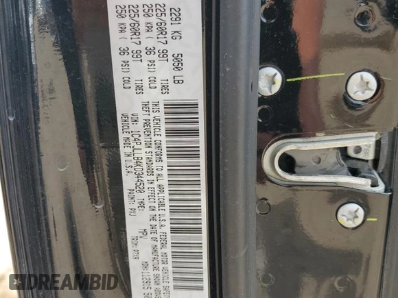 2019 Jeep Cherokee Latitude Plus with VIN 1C4PJLLB4KD344520, listed as a Copart auction lot 54535535 with 121,277 mi miles and Salvage Title. Bid and sale history available at DreamBid. Image 12.