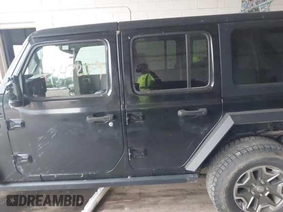 2021 Jeep Wrangler Unlimited Rubicon with VIN 1C4HJXFN2MW587168, listed as a IAAI auction lot 42472309 with 66,272 mi miles and . Bid and sale history available at DreamBid. Image 14.
