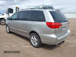 2005 Toyota Sienna LE with VIN 5TDBA23C95S052383, listed as a IAAI auction lot 41804026 with 203,429 mi miles. Bid and sale history available at carsss.com. Image 3.