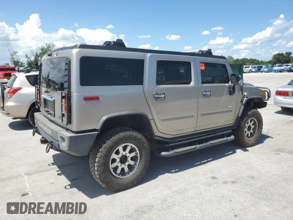 2003 Hummer H2 z VIN 5GRGN23U33H142552, wystawiony jako Copart lot #61152055 z przebiegiem Nie podano mil oraz Czysty tytuł • Clean title. Historia ofert i sprzedaży dostępna na DreamBid. Obrazek 3.