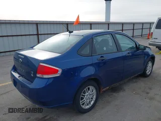 2009 Ford Focus SE with VIN 1FAHP35N39W176884, listed as a IAAI auction lot 41865864 with 193,747 mi miles. Bid and sale history available at carsss.com. Image 4.