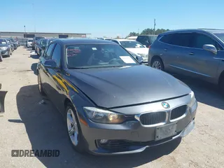 2012 BMW 3 Series 328i with VIN WBA3A5C53CFJ89806, listed as a IAAI auction lot 41703272 with 111,238 mi miles. Bid and sale history available at carsss.com. Image 1.
