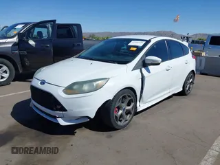 2014 Ford Focus ST with VIN 1FADP3L92EL341579, listed as a IAAI auction lot 42106528 with 104,150 mi miles and . Bid and sale history available at carsss.com. Image 17.