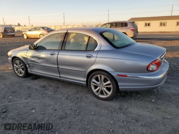 2007 Jaguar X-Type z VIN SAJWA51A27WJ21259, wystawiony jako Copart lot #42643115 z przebiegiem 106 800 mil mil oraz Szkody całkowita. Historia ofert i sprzedaży dostępna na DreamBid. Obrazek 2.