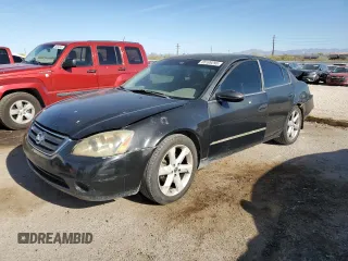 2002 Nissan Altima S with VIN 1N4AL11E52C112635, listed as a Copart auction lot 55109295 with 204,304 mi miles and Salvage title. Bid and sale history available at DreamBid. Image 1.