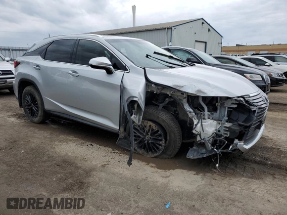 2016 Lexus RX 350 with VIN 2T2BZMCA4GC042001, listed as a Copart auction lot 52224275 with 235,659 mi miles and Salvage title. Bid and sale history available at DreamBid. Image 4.