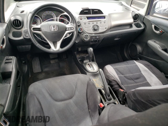 2009 Honda Fit Sport z VIN JHMGE88419S039797, wystawiony jako Copart lot #56866245 z przebiegiem 162 896 mil mil oraz Szkoda całkowita • Salvage title. Historia ofert i sprzedaży dostępna na DreamBid. Obrazek 8.