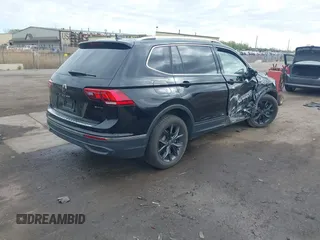 2024 Volkswagen Tiguan SE with VIN 3VVMB7AX7RM042855, listed as a IAAI auction lot 42223748 with 14,077 mi miles and . Bid and sale history available at DreamBid. Image 4.