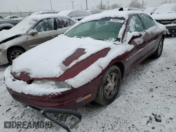 1999 Oldsmobile Aurora with VIN 1G3GR62C8X4113745, listed as a Copart auction lot 60573923 with 177,809 mi miles and Salvage Title. Bid and sale history available at DreamBid. Image 1.