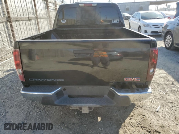 2005 GMC Canyon 1SF SLE Z71 with VIN 1GTDT136X58194608, listed as a Copart auction lot 83257094 with 260,923 mi miles and Salvage Title. Bid and sale history available at carsss.com. Image 6.
