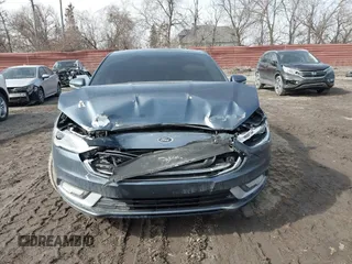 2018 Ford Fusion Titanium with VIN 3FA6P0D94JR187880, listed as a IAAI auction lot 41690869 with 120,214 mi miles and . Bid and sale history available at DreamBid. Image 12.