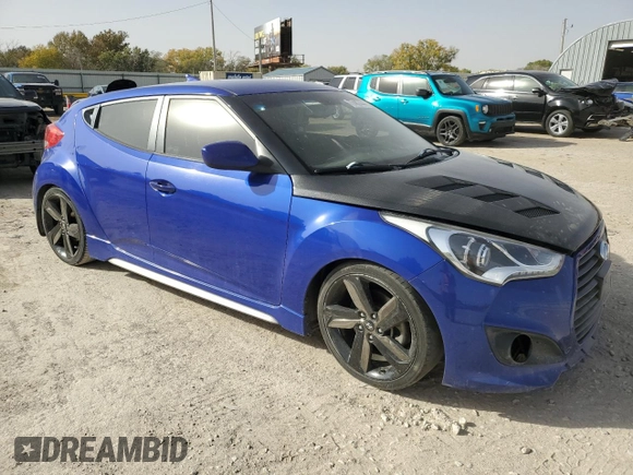 2014 Hyundai Veloster Turbo with VIN KMHTC6AE8EU201724, listed as a Copart auction lot 77487444 with 163,334 mi miles and Salvage Title. Bid and sale history available at carsss.com. Image 4.