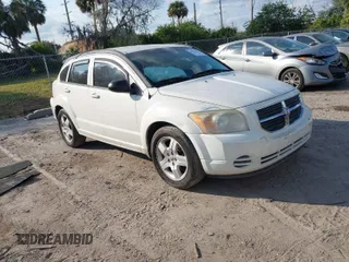 2009 Dodge Caliber SXT with VIN 1B3HB48A69D130857, listed as a IAAI auction lot 41526199 with 163,796 mi miles and . Bid and sale history available at DreamBid. Image 1.
