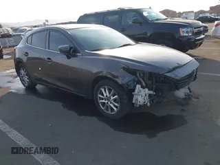 2015 Mazda Mazda3 i Touring with VIN 3MZBM1L74FM236410, listed as a IAAI auction lot 41339253 with 119,731 mi miles. Bid and sale history available at carsss.com. Image 1.