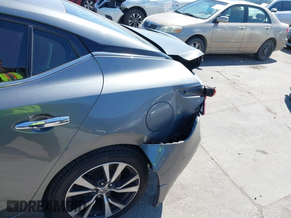 2016 Nissan Maxima SR with VIN 1N4AA6AP9GC414943, listed as a IAAI auction lot 41976295 with 154,738 mi miles and . Bid and sale history available at DreamBid. Image 6.