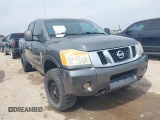 2013 Nissan Titan PRO-4X with VIN 1N6BA0EC6DN304416, listed as a IAAI auction lot 41665429 with 175,866 mi miles. Bid and sale history available at carsss.com. Image 1.