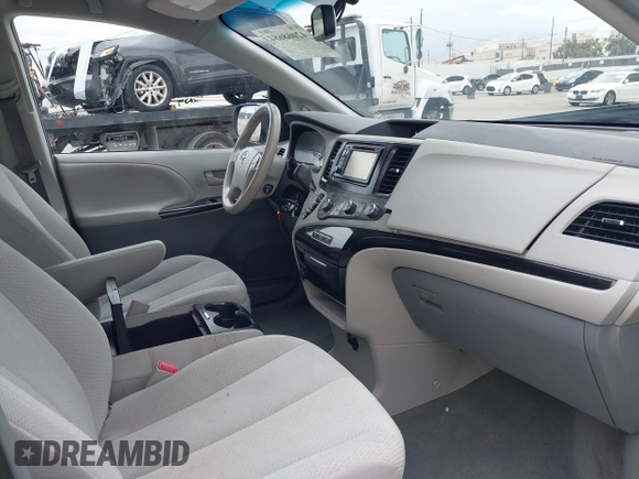 2012 Toyota Sienna LE AAS with VIN 5TDKK3DC8CS232582, listed as a IAAI auction lot 42068684 with 89,556 mi miles and . Bid and sale history available at DreamBid. Image 5.