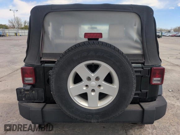 2010 Jeep Wrangler Sport with VIN 1J4AA2D16AL127197, listed as a Copart auction lot 54192935 with 200,595 mi miles and Clean Title. Bid and sale history available at carsss.com. Image 6.