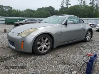 2003 Nissan 350Z Performance z VIN JN1AZ34D33T106988, wystawiony jako Copart lot #57933985 z przebiegiem 203 959 mil mil oraz Szkoda całkowita • Salvage title. Historia ofert i sprzedaży dostępna na DreamBid. Obrazek 1.