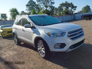 2017 Ford Escape Titanium with VIN 1FMCU0J90HUC51244, listed as a IAAI auction lot 42206165 with 106,847 mi miles and . Bid and sale history available at DreamBid. Image 1.