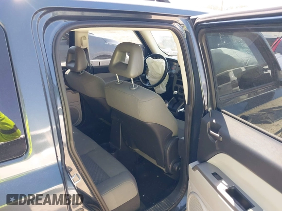 2007 Jeep Patriot Sport with VIN 1J8FT28W57D410875, listed as a IAAI auction lot 41767588 with 127,735 mi miles and . Bid and sale history available at DreamBid. Image 8.