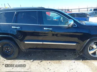 2013 Jeep Grand Cherokee Overland with VIN 1C4RJFCT1DC654653, listed as a IAAI auction lot 41826619 with 124,283 mi miles. Bid and sale history available at carsss.com. Image 14.