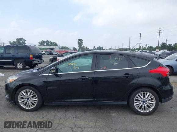 2017 Ford Focus Titanium with VIN 1FADP3N2XHL230766, listed as a IAAI auction lot 42386275 with 64,138 mi miles and . Bid and sale history available at DreamBid. Image 14.
