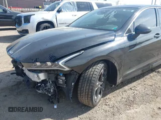 2023 Kia K5 GT-Line z VIN 5XXG64J22PG186976, wystawiony jako IAAI lot #42241886 z przebiegiem 39 502 mil mil oraz . Historia ofert i sprzedaży dostępna na DreamBid. Obrazek 6.