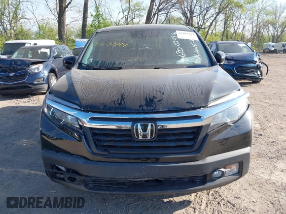2020 Honda Ridgeline RTL with VIN 5FPYK3F52LB024816, listed as a IAAI auction lot 42103344 with 68,700 mi miles and . Bid and sale history available at DreamBid. Image 12.