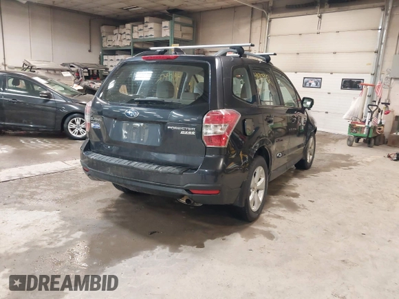 2016 Subaru Forester 2.5i with VIN JF2SJABC1GH421242, listed as a IAAI auction lot 41910942 with 104,217 mi miles and . Bid and sale history available at DreamBid. Image 4.