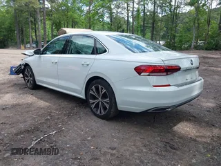 2021 Volkswagen Passat SE with VIN 1VWSA7A38MC014396, listed as a IAAI auction lot 42201818 with 62,193 mi miles and . Bid and sale history available at DreamBid. Image 3.