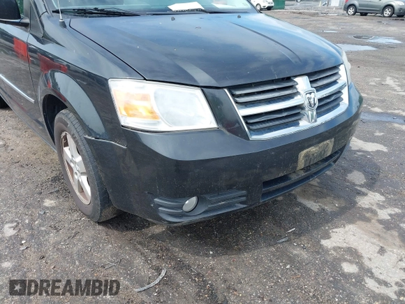 2010 Dodge Grand Caravan SXT with VIN 2D4RN5D11AR459864, listed as a IAAI auction lot 42197818 with 149,553 mi miles and . Bid and sale history available at DreamBid. Image 6.