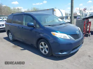 2012 Toyota Sienna LE AAS with VIN 5TDKK3DC7CS274726, listed as a IAAI auction lot 42126219 with 184,158 mi miles. Bid and sale history available at carsss.com. Image 1.