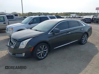 2013 Cadillac XTS Luxury with VIN 2G61P5S3XD9228218, listed as a IAAI auction lot 40503666 with 87,857 mi miles. Bid and sale history available at carsss.com. Image 2.