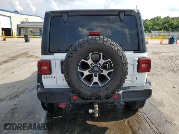 2019 Jeep Wrangler Unlimited Rubicon with VIN 1C4HJXFGXKW613269, listed as a Copart auction lot 62428605 with 56,270 mi miles and Salvage title. Bid and sale history available at DreamBid. Image 6.